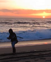 Fisherman at Moss Landing State Beach